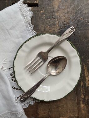 Vintage silver plated baby spoon and fork with embossed daffodil. Rogers Bros